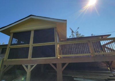 outdoor patio screen enclosure with deck - rear view